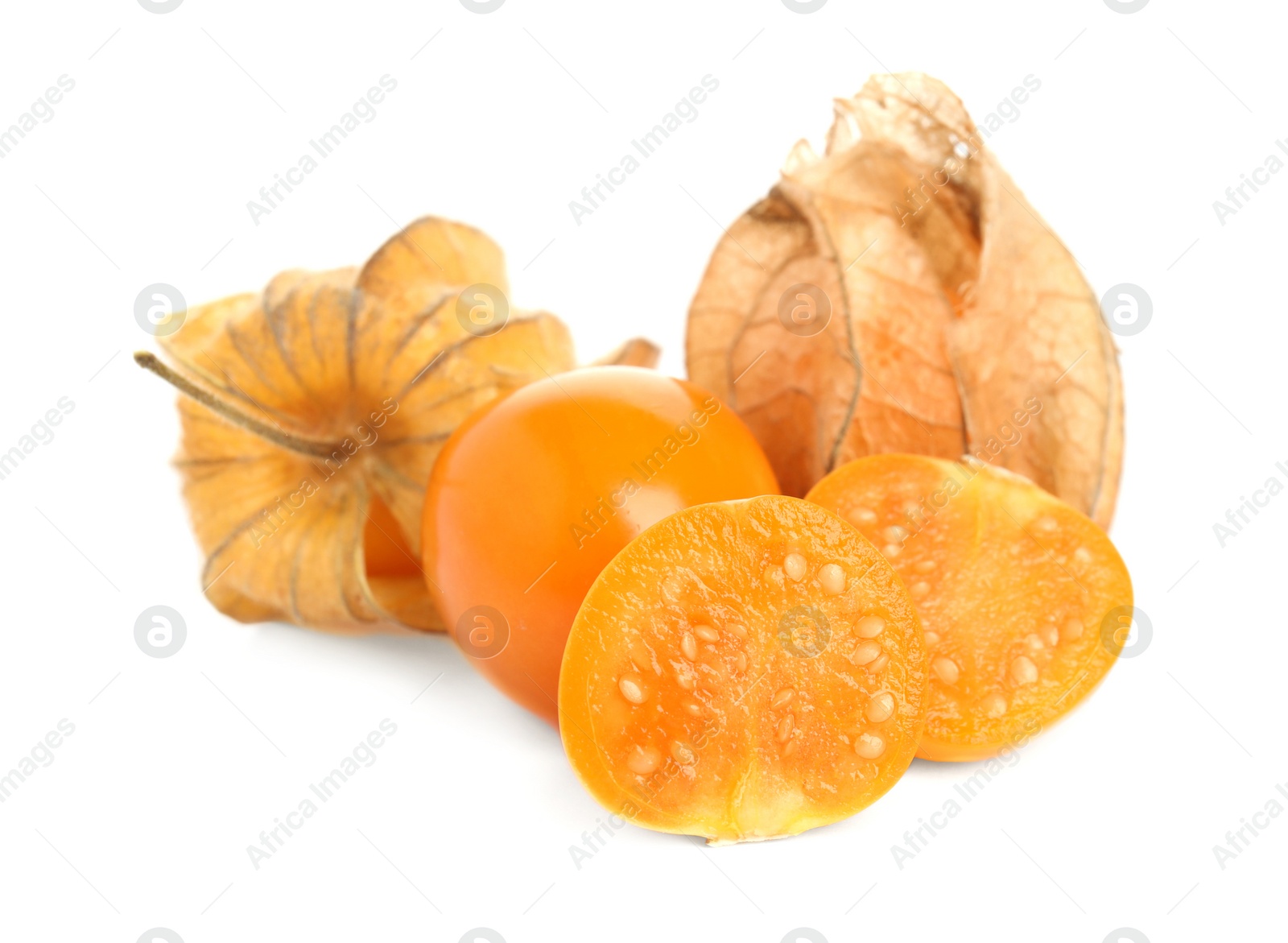 Photo of Cut and whole physalis fruits with dry husk on white background