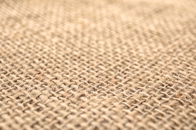 Texture of sustainable hemp fabric as background, closeup