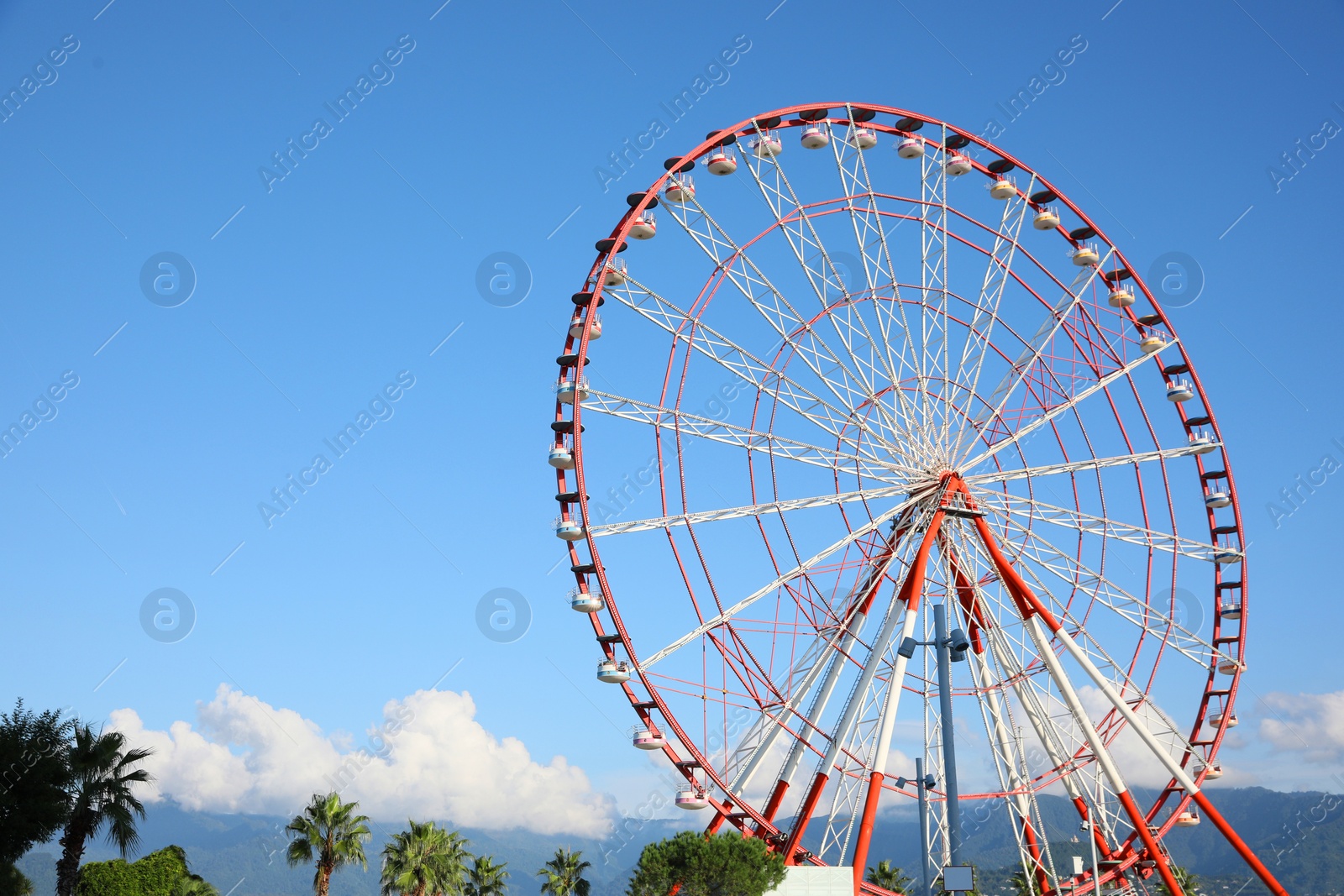 Photo of Beautiful large Ferris wheel outdoors, space for text