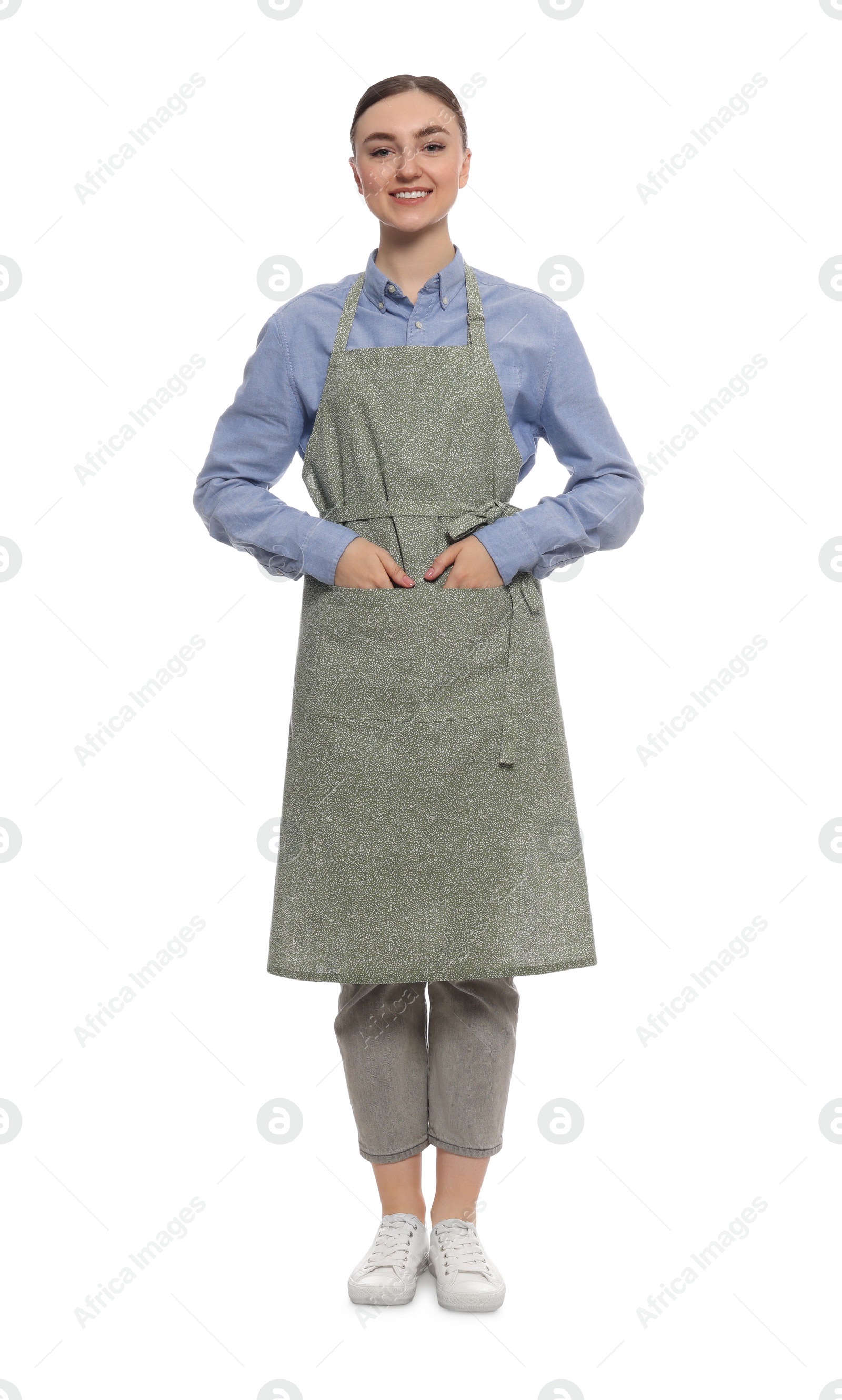 Photo of Beautiful young woman in clean apron on white background