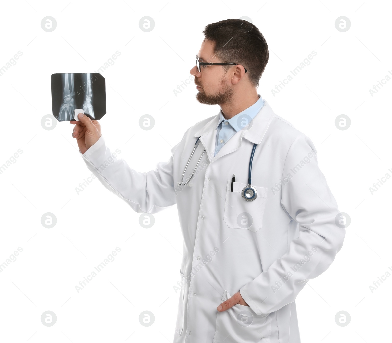 Photo of Orthopedist holding X-ray picture on white background