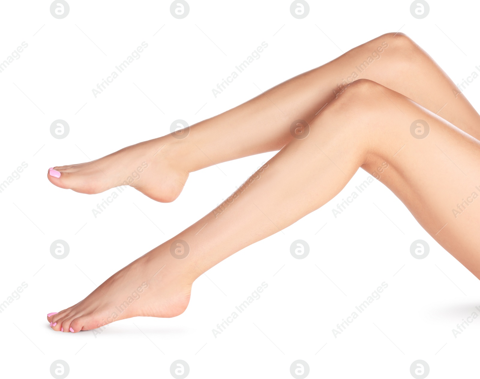 Photo of Woman with beautiful long legs on white background, closeup