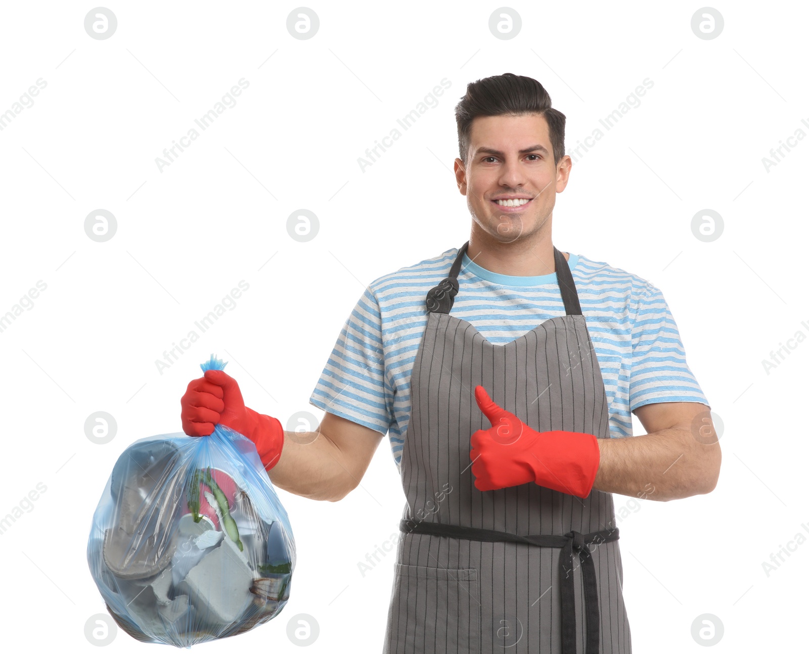 Photo of Man holding full garbage bag on white background