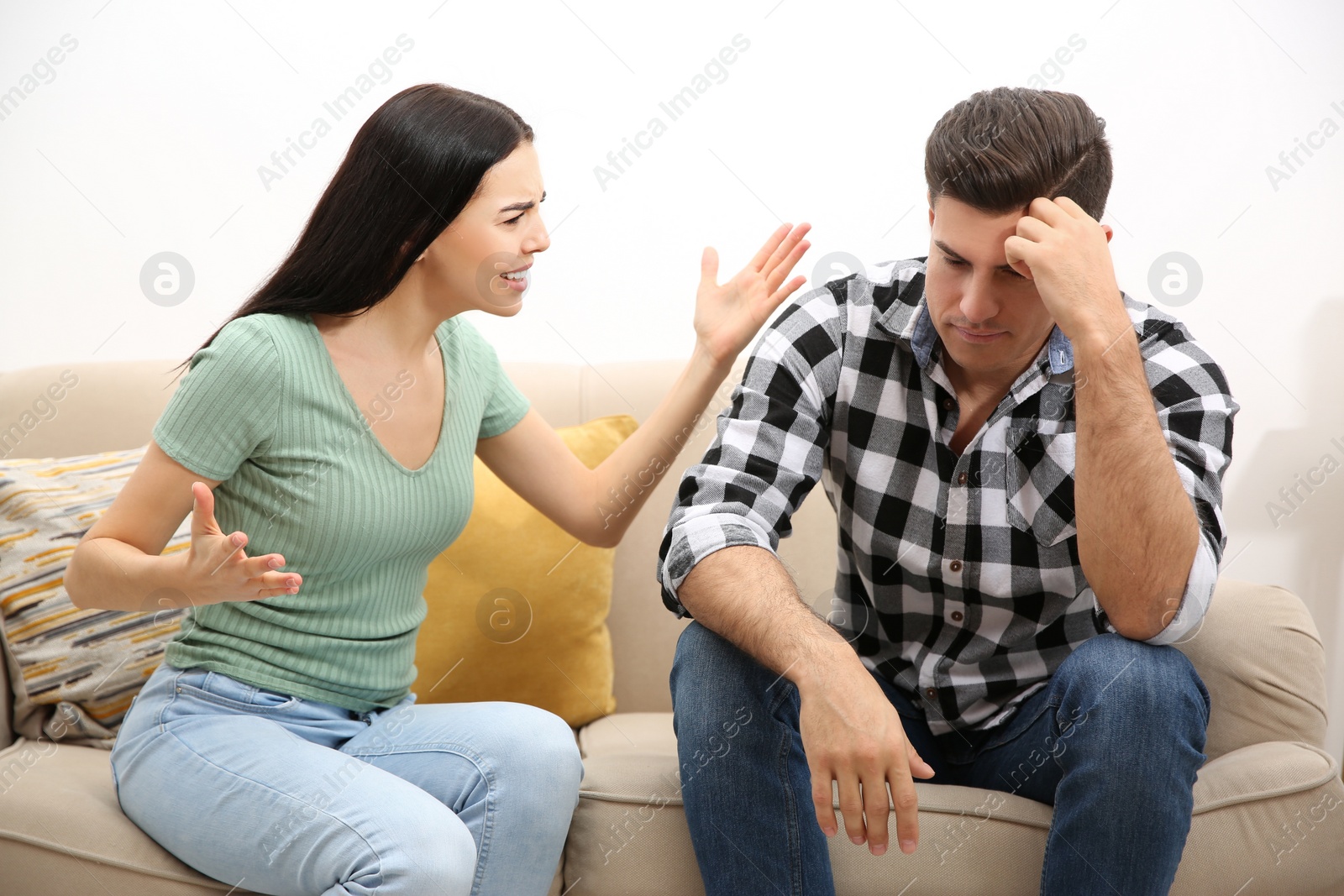 Photo of Couple having quarrel at home. Relationship problems