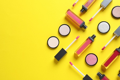 Photo of Composition with lipsticks on color background, flat lay. Space for text