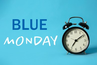 Image of Alarm clock and text Blue Monday on color background