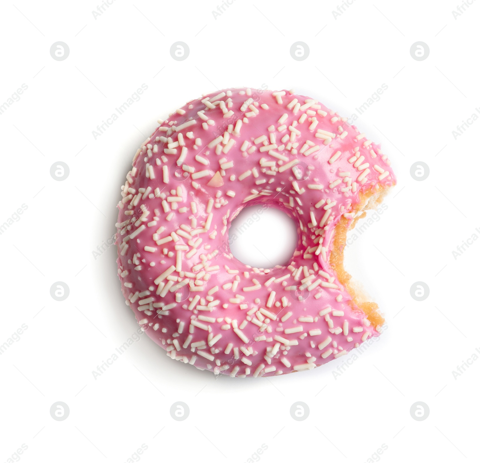 Photo of Delicious bitten doughnut with sprinkles on light background