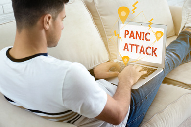Image of Man working with laptop at home. Use information safely to avoid panic attack
