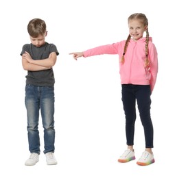 Photo of Girl laughing and pointing at upset boy on white background. Children's bullying