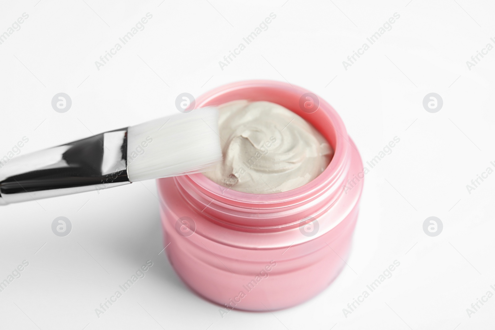 Photo of Professional face mask with brush on white background