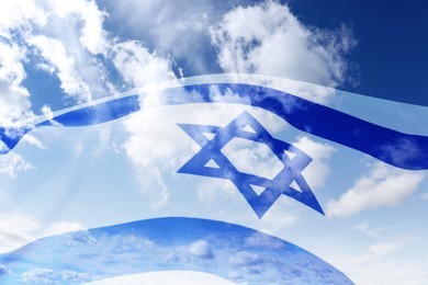 Image of National flag of Israel and blue sky with clouds, double exposure