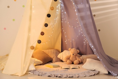 Modern children's room interior with play tent