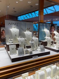 Photo of WARSAW, POLAND - JULY 17, 2022: Showcase with beautiful jewelry of Apart store in shopping mall