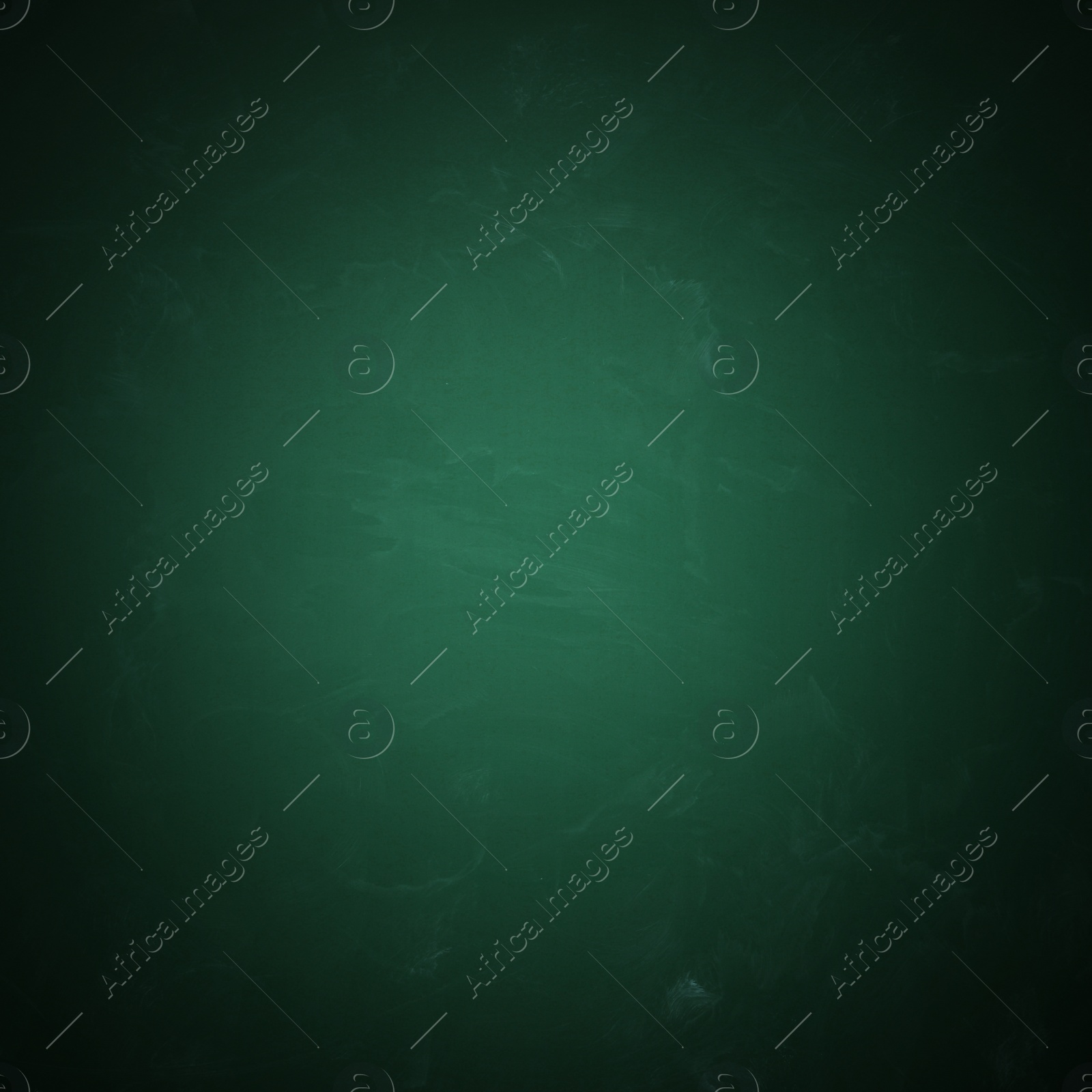 Image of Dirty green chalkboard as background. Vignette effect