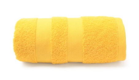 Rolled yellow terry towel isolated on white