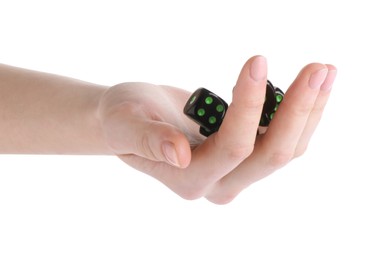 Photo of Woman throwing game dices on white background, closeup