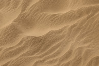 Photo of Closeup view of sand dune in desert as background