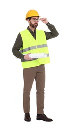 Photo of Architect in hard hat with draft on white background