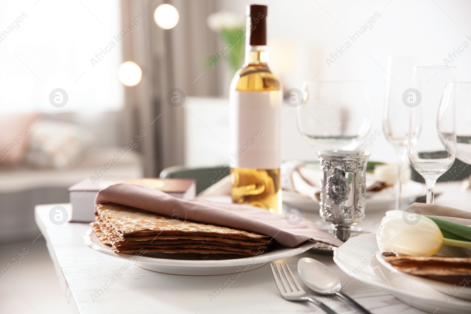 Photo of Festive Passover table setting at home. Pesach celebration