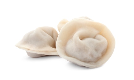 Photo of Fresh tasty boiled dumplings on white background