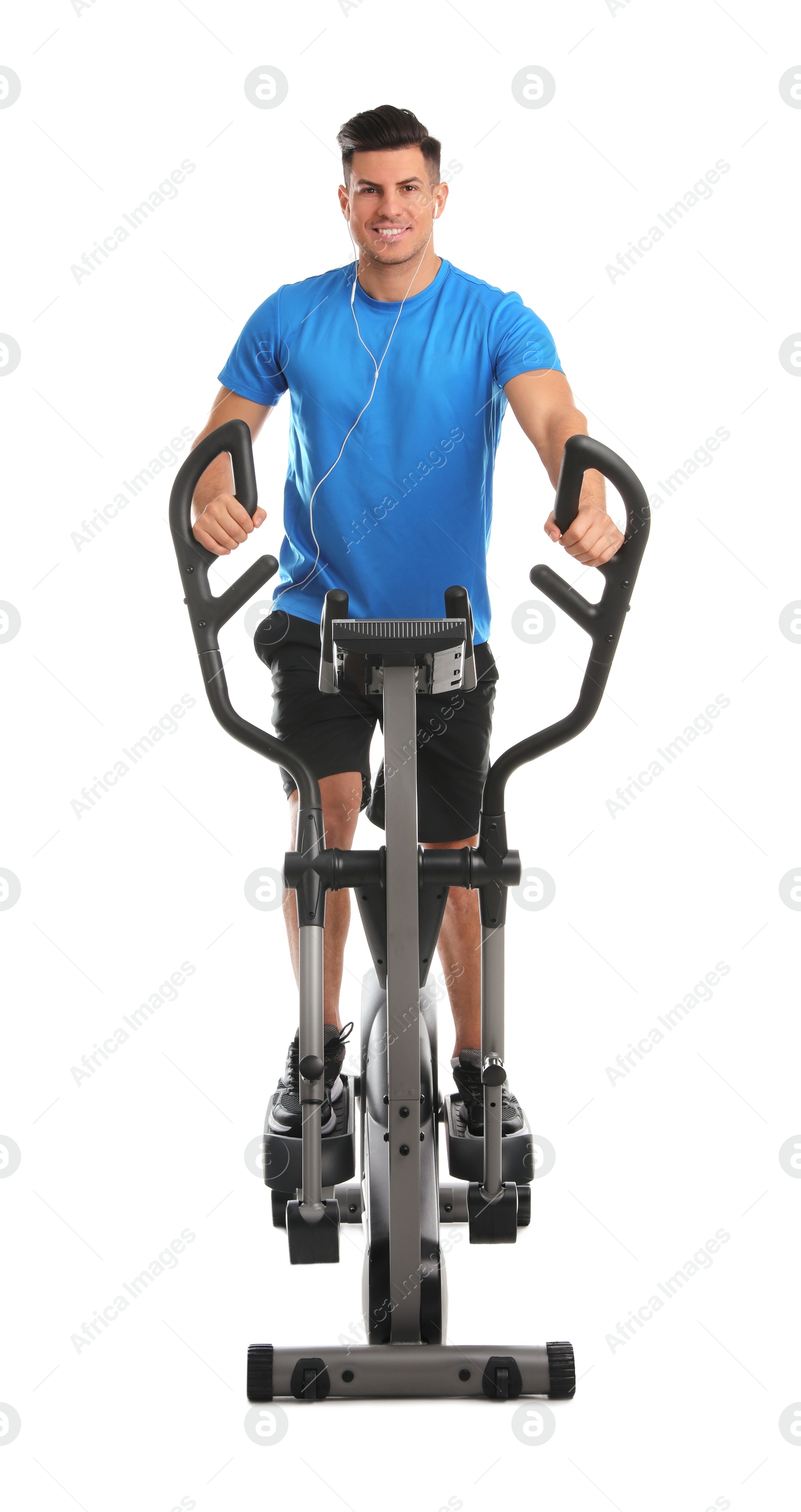 Photo of Man using modern elliptical machine on white background