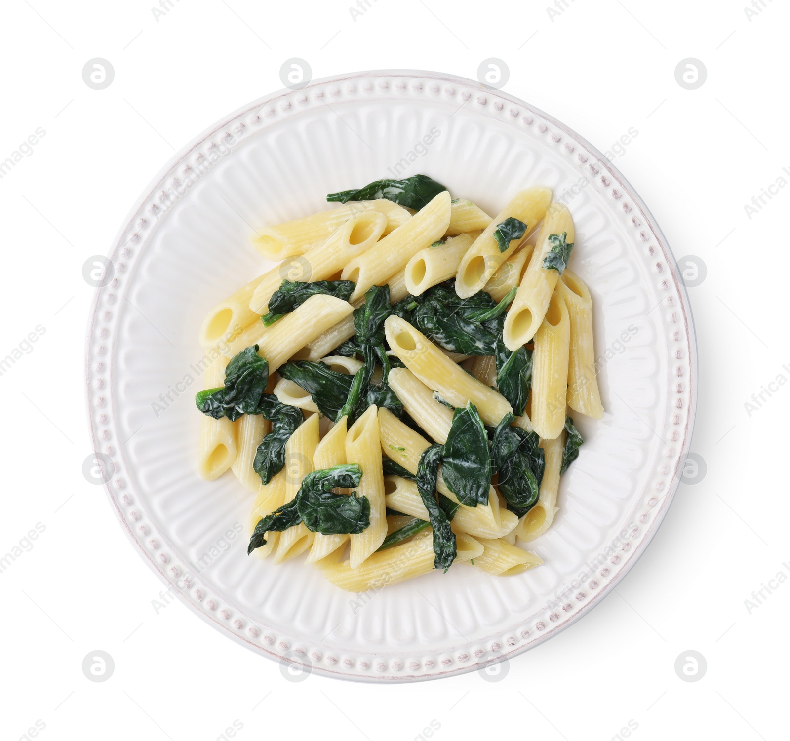 Photo of Tasty pasta with spinach and sauce isolated on white, top view