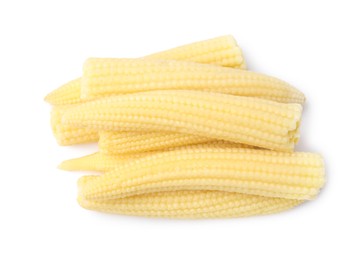 Photo of Tasty fresh baby corns isolated on white, top view