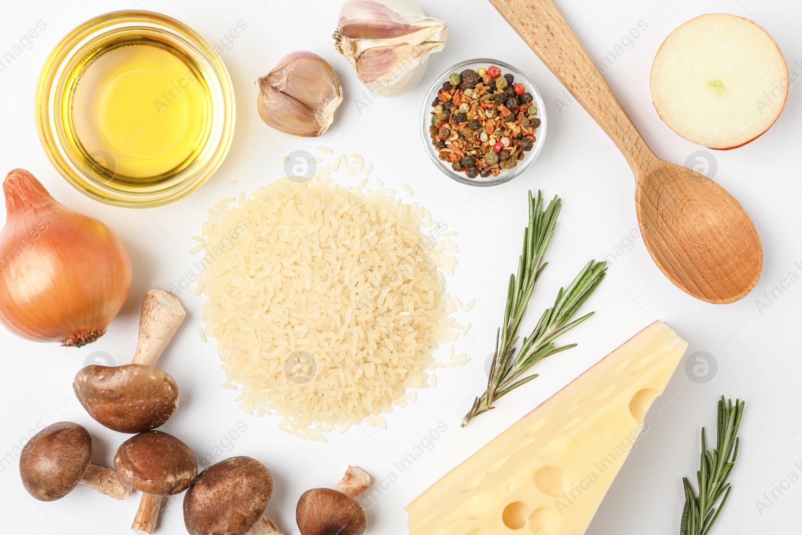 Photo of Different ingredients on white background, top view. Risotto recipe