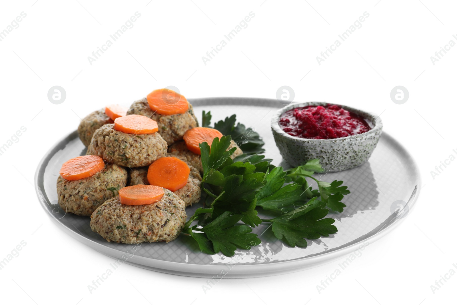 Photo of Plate of traditional Passover (Pesach) gefilte fish isolated on white