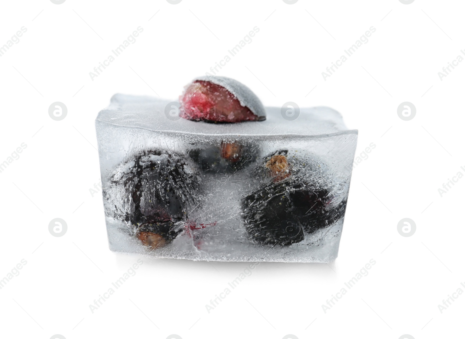 Photo of Raw berries frozen in ice cube on white background