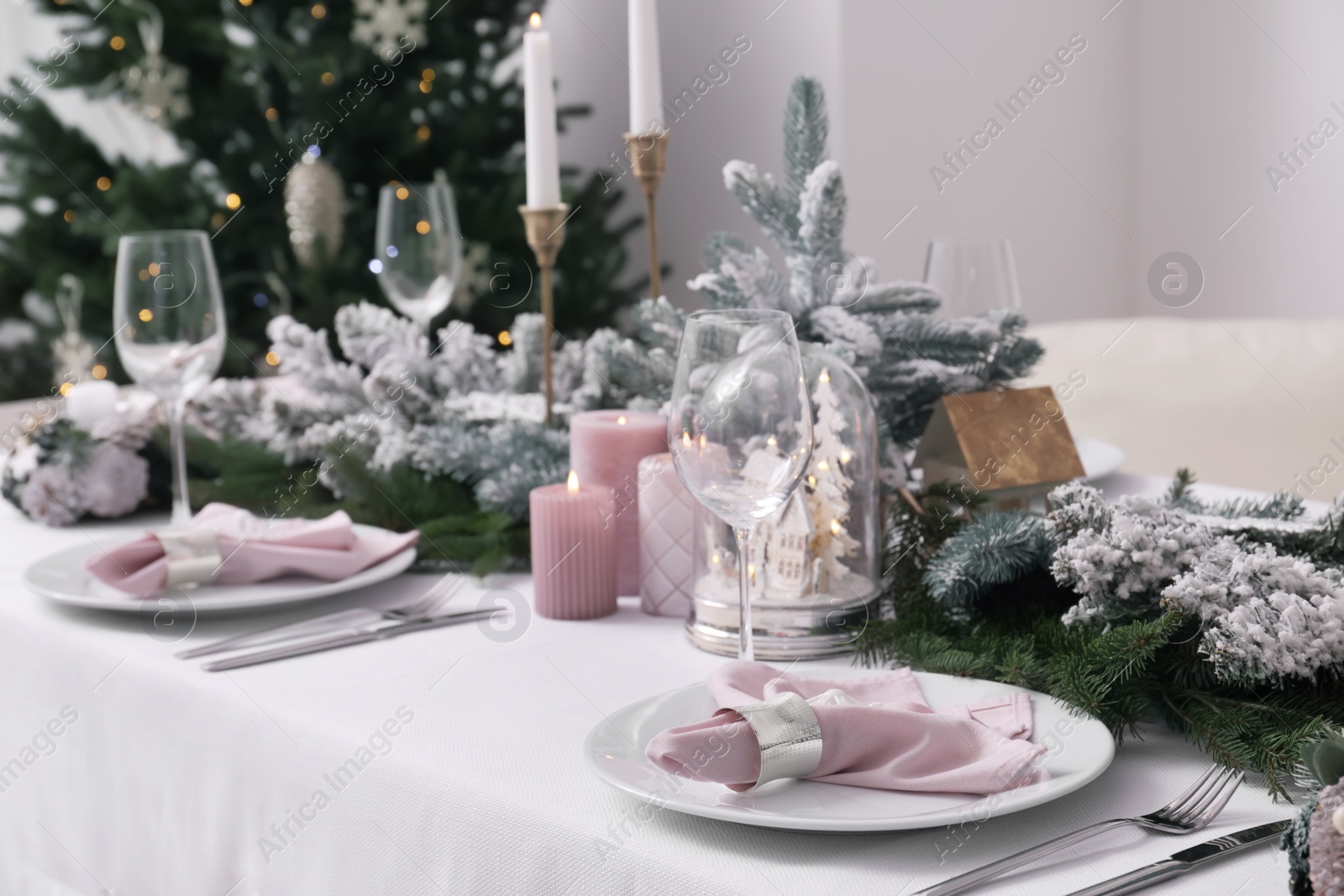 Photo of Beautiful table setting with Christmas decor indoors