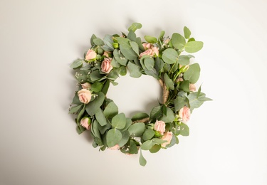 Photo of Wreath made of beautiful flowers isolated on white