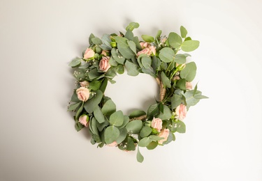 Wreath made of beautiful flowers isolated on white