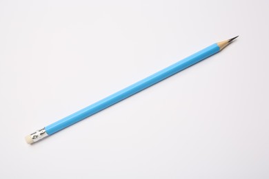 Photo of Sharp graphite pencil on white background, top view