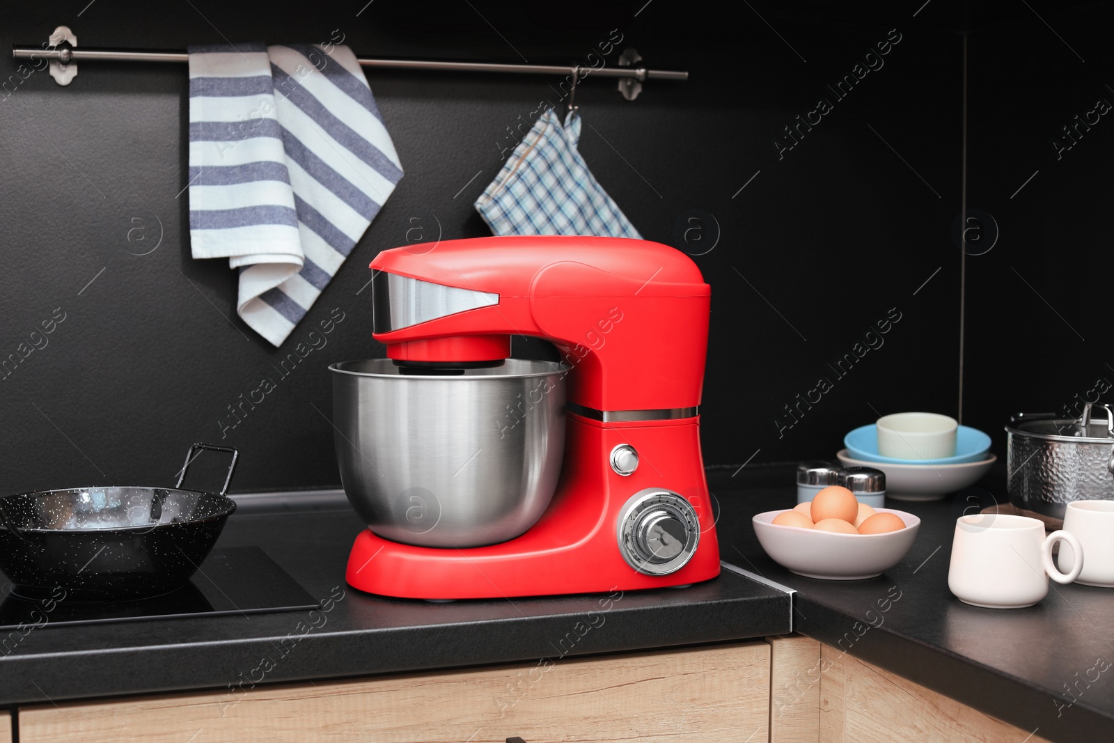 Photo of Modern stand mixer on countertop in kitchen