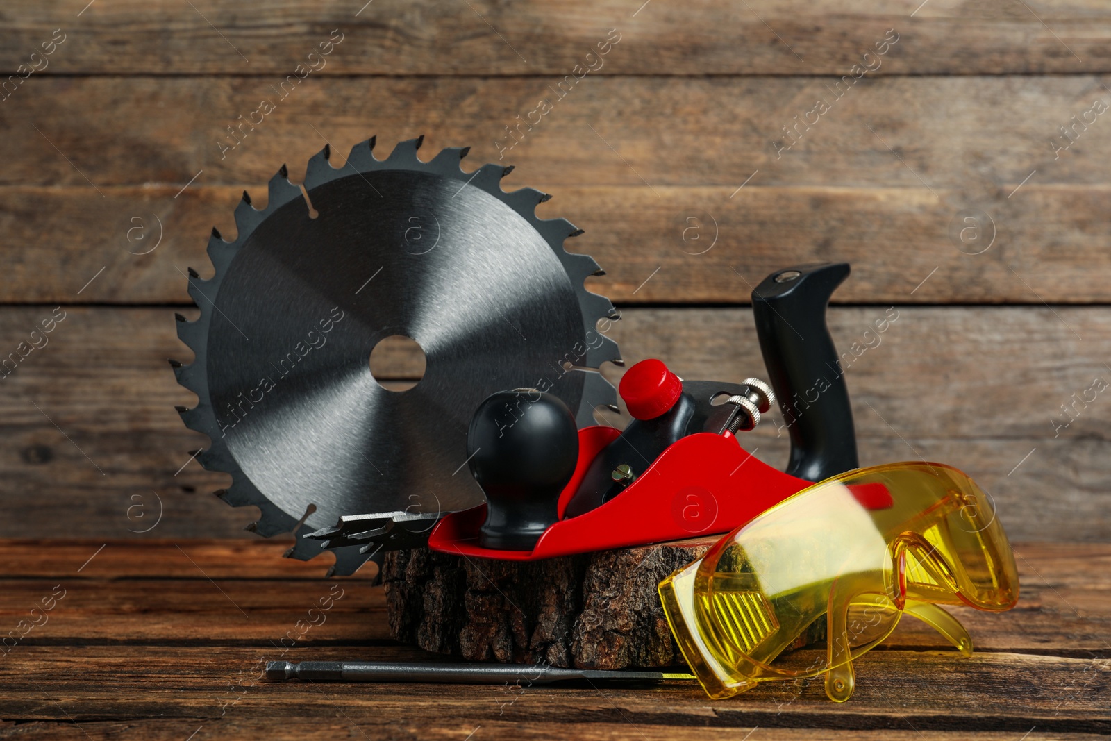 Photo of Set of modern carpenter's tools on wooden table