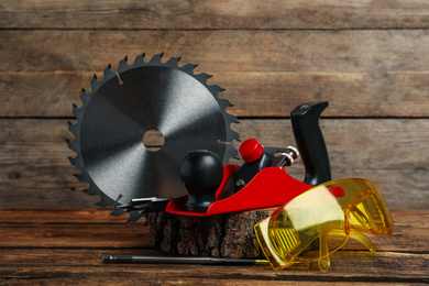 Set of modern carpenter's tools on wooden table