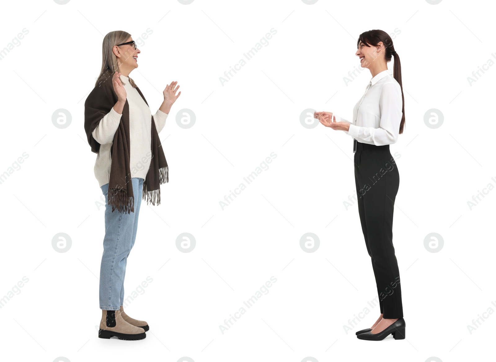 Image of Two women talking on white background. Dialogue