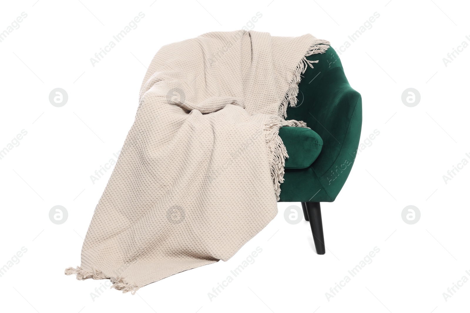 Photo of One stylish comfortable armchair with blanket isolated on white