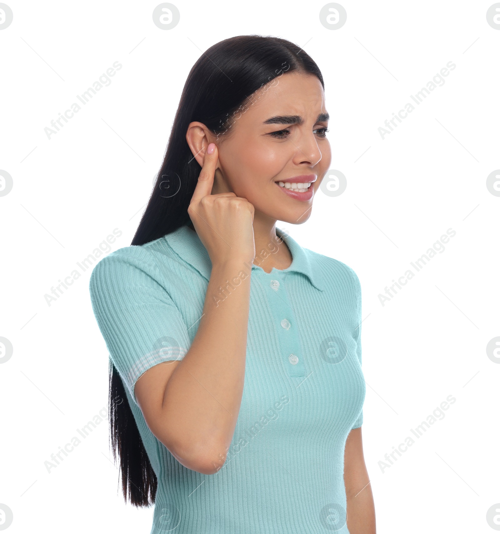 Photo of Young woman suffering from ear pain on white background