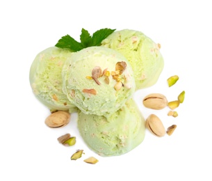 Scoops of delicious pistachio ice cream on white background, top view