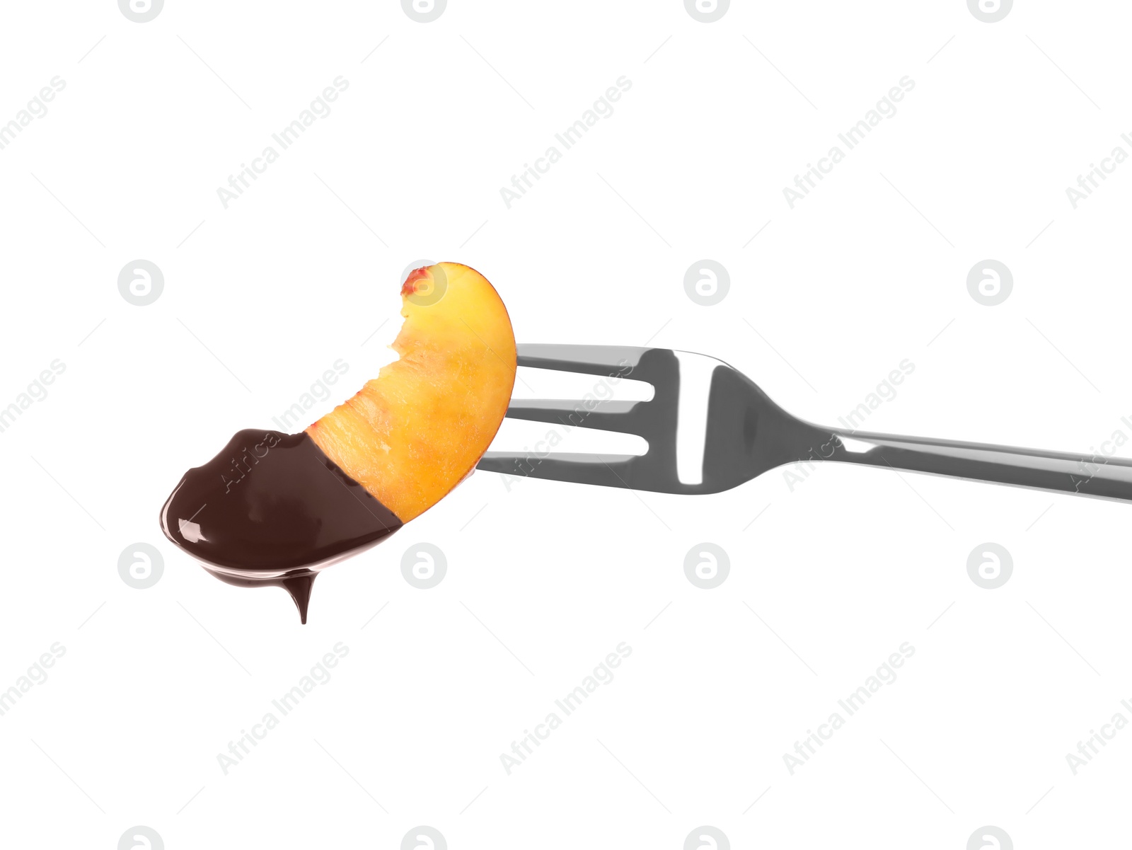 Photo of Tasty peach dipped into chocolate fondue on white background