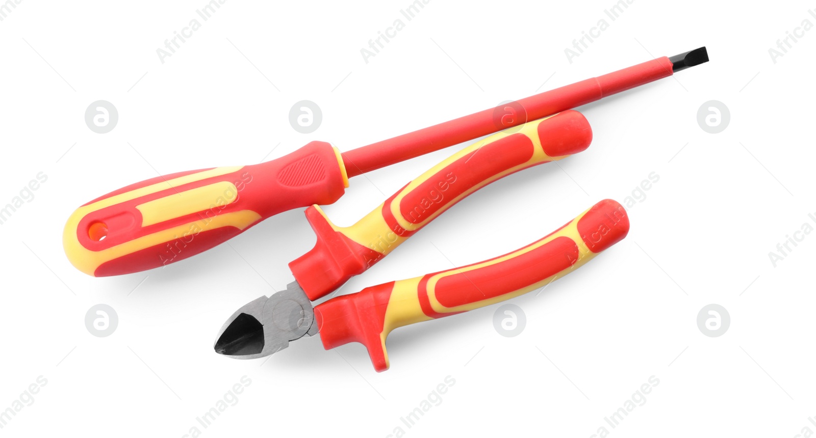 Photo of Cutting pliers and screwdriver on white background, top view. Electrician's tools