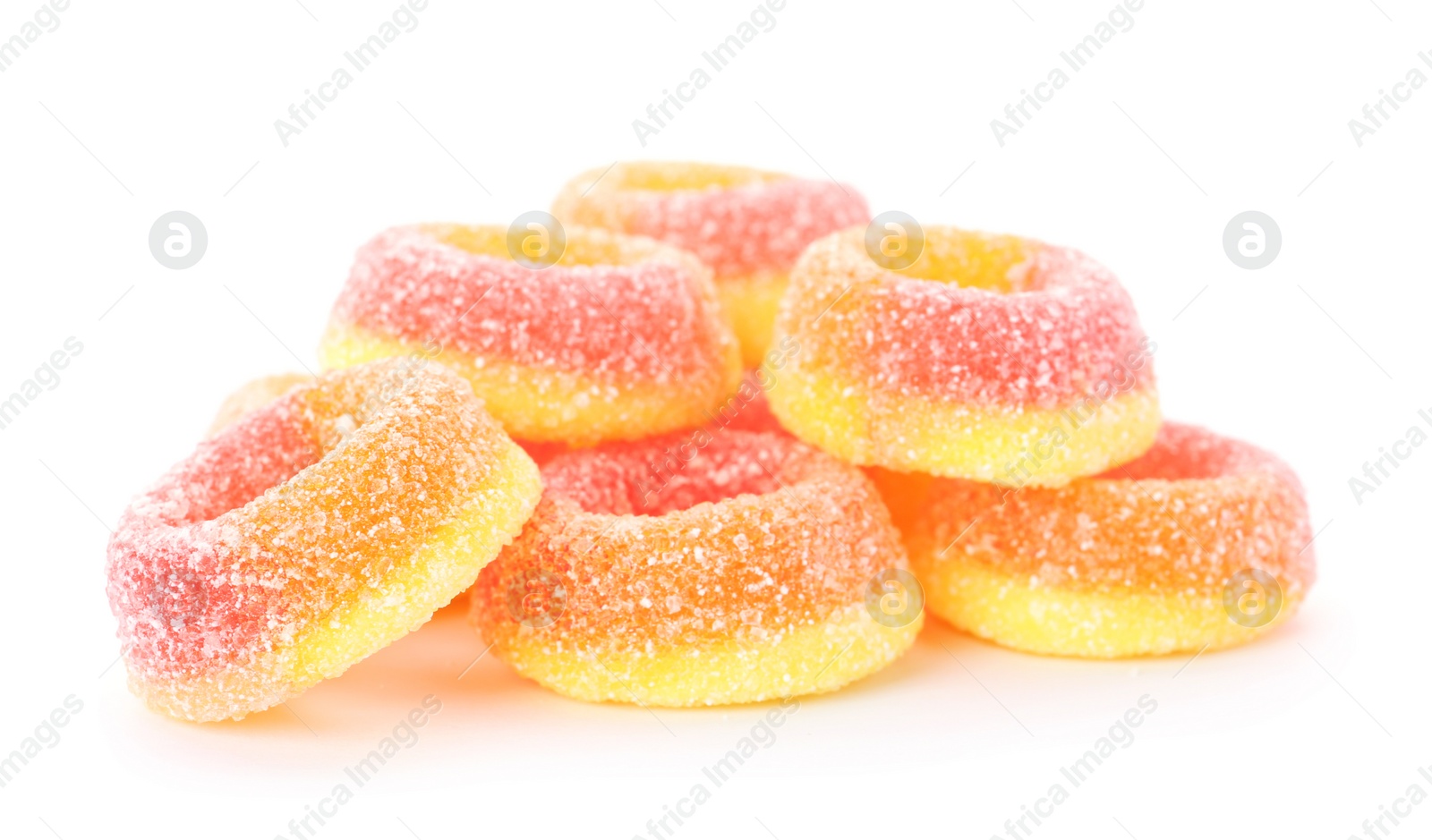 Photo of Pile of delicious jelly candies on white background