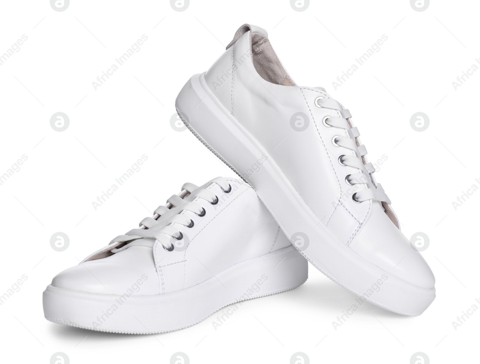 Photo of Pair of stylish sneakers isolated on white