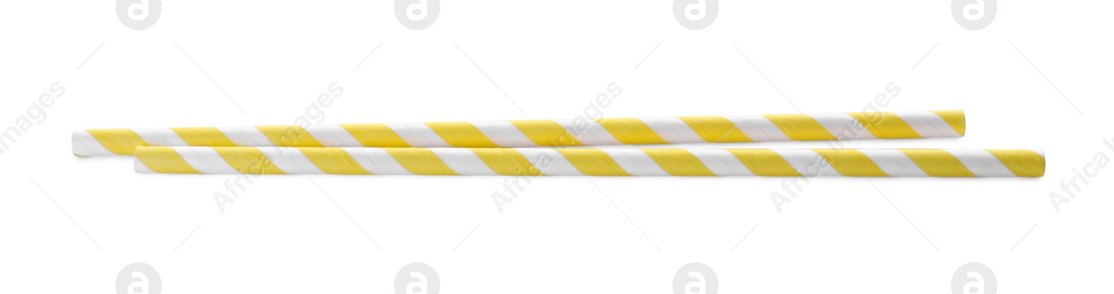 Photo of Striped paper cocktail straws on white background