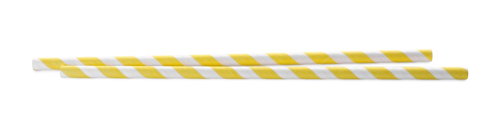 Photo of Striped paper cocktail straws on white background