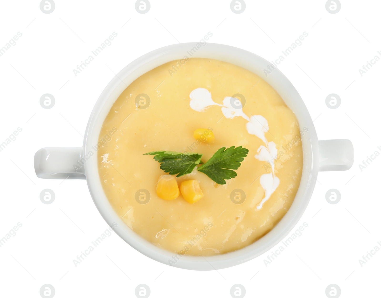 Photo of Delicious corn cream soup isolated on white, top view