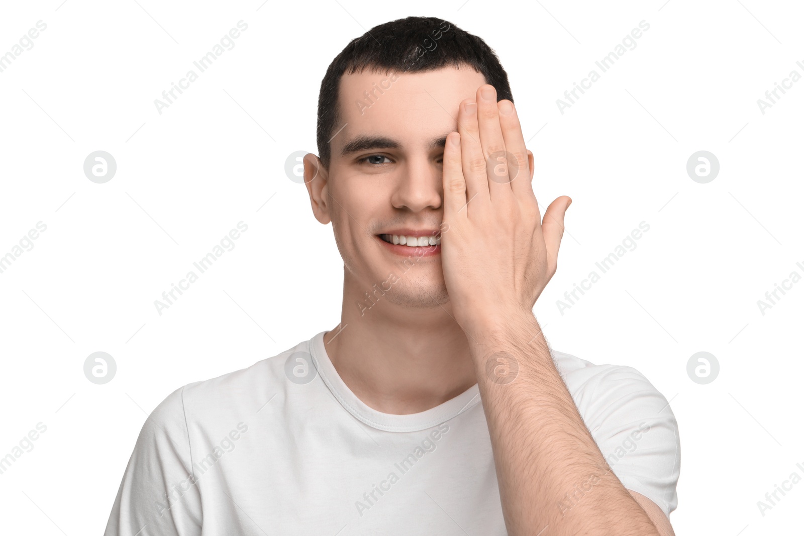 Photo of Young man covering his eye on white background