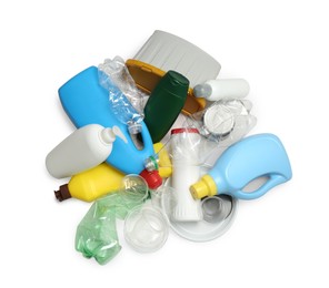 Pile of plastic garbage on white background, top view